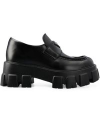 Prada - Monolith Brushed Leather Loafers - Lyst