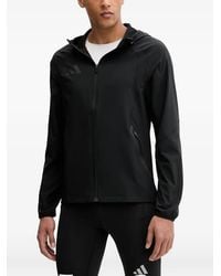 adidas - Travel Hooded Logo-Print Jacket - Lyst