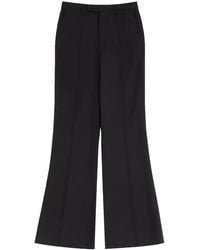 Valentino Garavani - Pleated Flared Trousers - Lyst