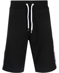 Homme Vêtements Articles de sport et dentraînement Shorts de sport Bermuda shorts Moschino pour homme en coloris Noir 