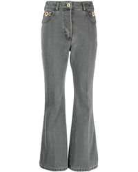 Patou - Logo-Embroidered Flared Jeans - Lyst