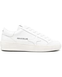 AMA BRAND - Star-Appliqué Sneakers - Lyst