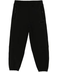 HUGO - Pantalones de chándal con logo estampado - Lyst
