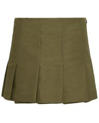 Prada - Pleated Canvas Mini Skirt - Lyst