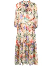 Anjuna - Vestido largo acampanado con estampado floral - Lyst