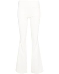 Courreges - Logo-Embroidered Bootcut Trousers - Lyst