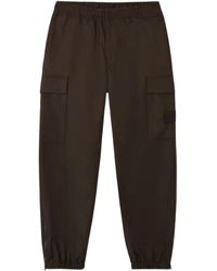 Stone Island - Broek Met Cargo Zak En Manchetten - Lyst