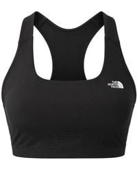 The North Face - Movmynt Logo-Print Racerback Sports Bra - Lyst
