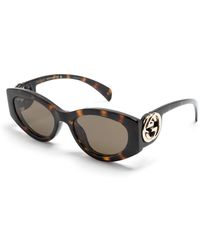 Gucci Cat Eye Tiger Sunglasses in Black | Lyst