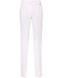 Liu Jo - Logo-Charm Trousers - Lyst