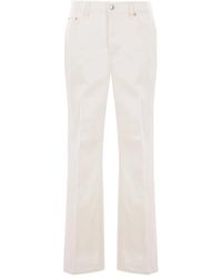Gucci - Logo-Patch Jeans - Lyst