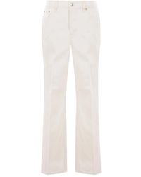 Gucci - Vaqueros con parche del logo - Lyst