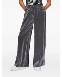 Liu Jo - Laminated Flared Pants - Lyst