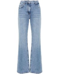 Moschino Jeans - Flared Jeans Met Acid-wassing - Lyst