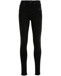 KARL LAGERFELD - Skinny Jeans With Crystal Logo - Lyst