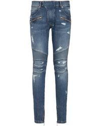 Balmain - Vintage wash biker denim jeans - Lyst