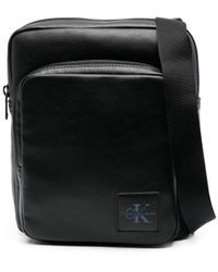Calvin Klein Borsa messenger con applicazione - Nero