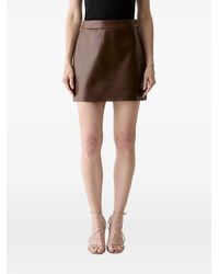 Guess - Mini Logo-Plaque Skirt - Lyst