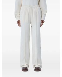 Moncler - Logo-Patch Hosen Mit Kordelzug - Lyst