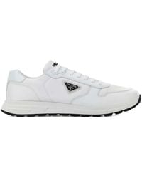 Prada - Sneakers mit Triangel-Logo - Lyst