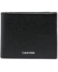 Calvin Klein - Logo Stamp Bi-Fold Leather Wallet - Lyst
