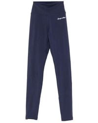 Sporty & Rich - Logo-Print Performance Leggings - Lyst
