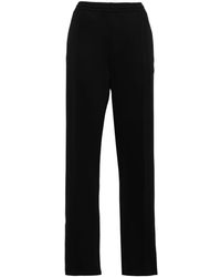 Moncler - Pantalones de chándal con aplique del logo - Lyst