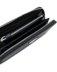 Prada - Saffiano zip wallet - Lyst