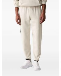 Under Armour - Unstoppable Fleece Logo-Plaque Track Pants - Lyst