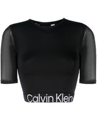 Calvin Klein Camiseta corta con cinturilla del logo - Negro
