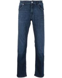 BOSS - Tapered-Jeans mit Logo-Patch - Lyst