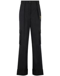 Moschino - Logo-Patch Cargo-Pockets Flared Trousers - Lyst