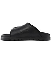 MCM - Embossed Monogram Leather Sandals - Lyst