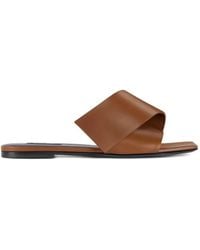 Givenchy - Flache Sandalen Mit Verdrehtem Riemen - Lyst