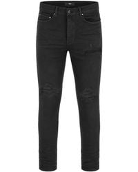 Amiri - Distressed Ribbed-Panel Jeans - Lyst