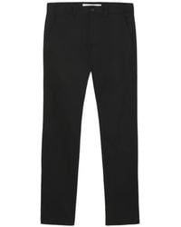 Lacoste - Pantalones con botones - Lyst