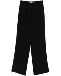 AYA MUSE - Trousers - Lyst