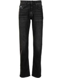 Versace - Slim-cut Dark-wash Jeans - Lyst