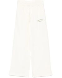 New Balance - Embroidered Cotton Sweatpants - Lyst