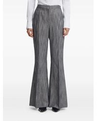 BOSS - Buttoned Flared Trousers - Lyst
