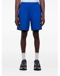 Stussy - Logo-Print Elasticated-Waist Shorts - Lyst