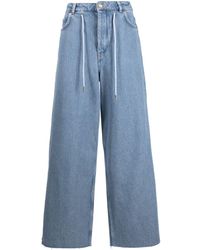 Ganni - Jeans a gamba ampia con coulisse - Lyst