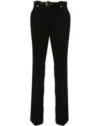Versace - Pantalones ajustados con cinturón - Lyst