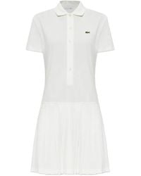 Lacoste - Pleated-Skirt Mini Polo Dress - Lyst