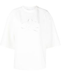 Genny - Motif-embroidered T-shirt - Lyst