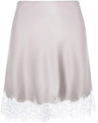 MANURI - Josephine Lace Mini Skirt - Lyst