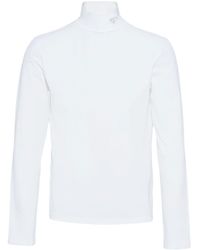 Prada - T-shirt a maniche lunghe con placca logo - Lyst