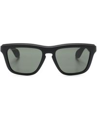 Gucci - Eckige Sonnenbrille mit perforiertem Logo - Lyst