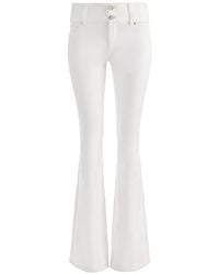 Alice + Olivia - Kai Flared Jeans - Lyst