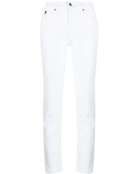 Calvin Klein Vaqueros slim de talle medio - Blanco